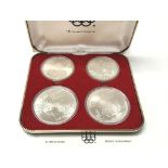 A 1976 Silver Olympic coin set. Postage A