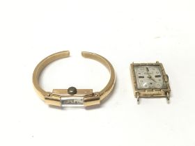 An 18ct watch not running 12.40g and a 14ct watch
