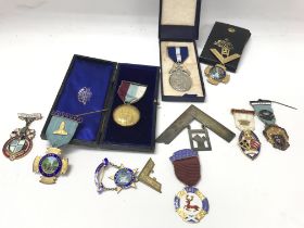 A collection of various Masonic medals including 9