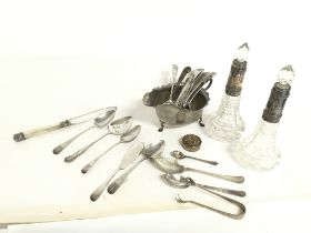 A collection of silver hallmarked spoons, a silver