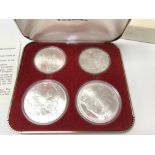 A 1976 Silver Olympic coin set. Postage A