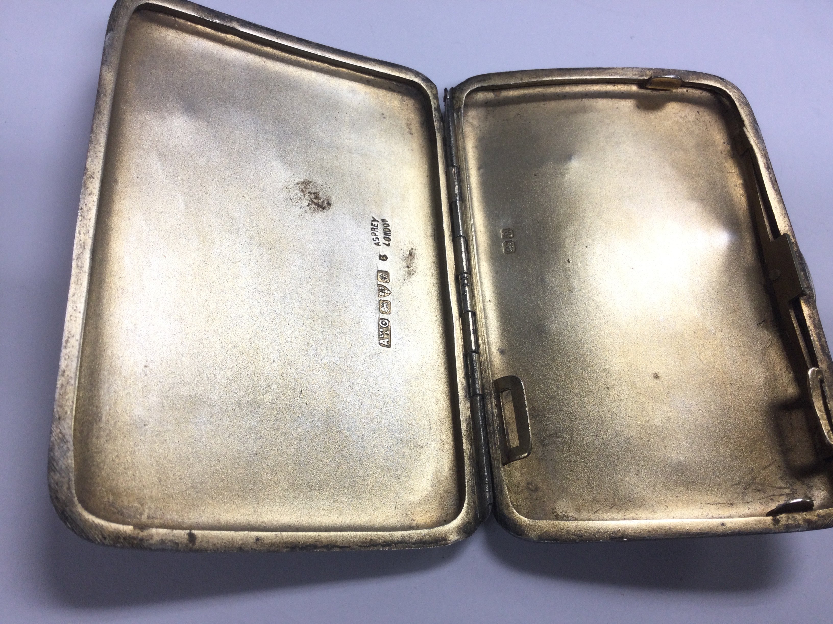 An Asprey silver cigarette case, Chester 1917. Shi - Image 2 of 2