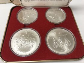 A 1976 Silver Olympic coin set. Postage A