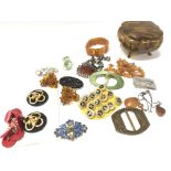 A Collection of vintage buckles and buttons along