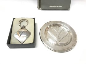A new Holland sterling silver tray and key ring.