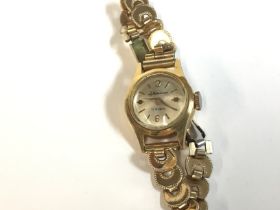 A ladies vintage 18ct gold La meridiana watch. Win