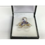 A certificated large stylish 18ct gold tanzanite a