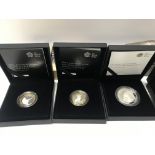 A collection of 6 silver proof coins.