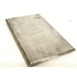 A silver hallmarked cigarette case, postage catego