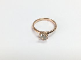A certificated 18ct rose gold diamond solitaire ri