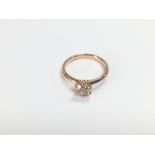 A certificated 18ct rose gold diamond solitaire ri