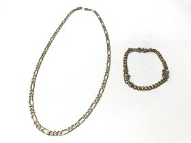 A 9ct gold diamond cut necklace and a 9ct gold bra