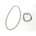 A 9ct gold diamond cut necklace and a 9ct gold bra