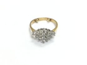 An 18ct gold diamond cluster ring, approx 4.19g an