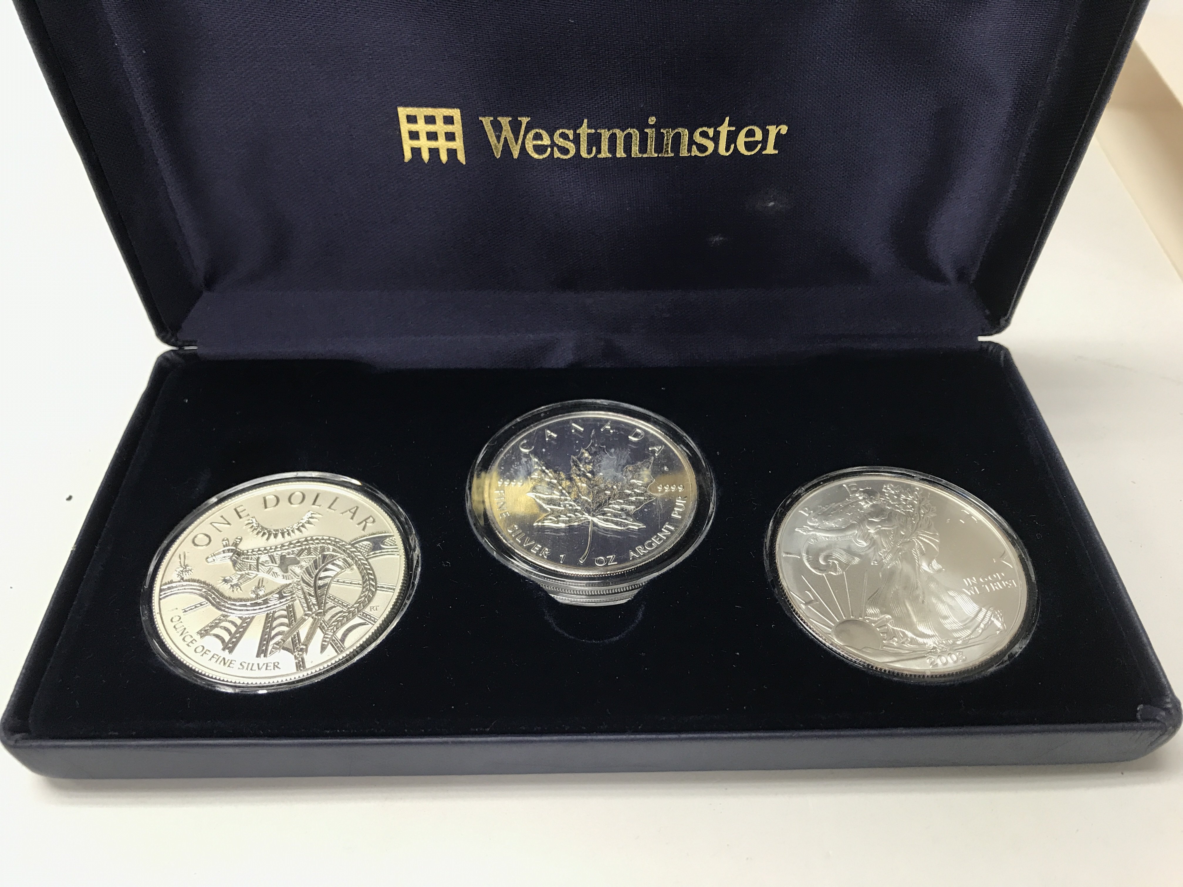 A set of three 2003 1oz silver coins including a m