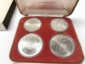 A 1976 Silver Olympic coin set. Postage A