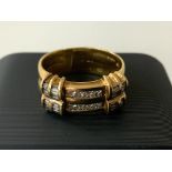 An 18ct gold double ring set with round brilliant