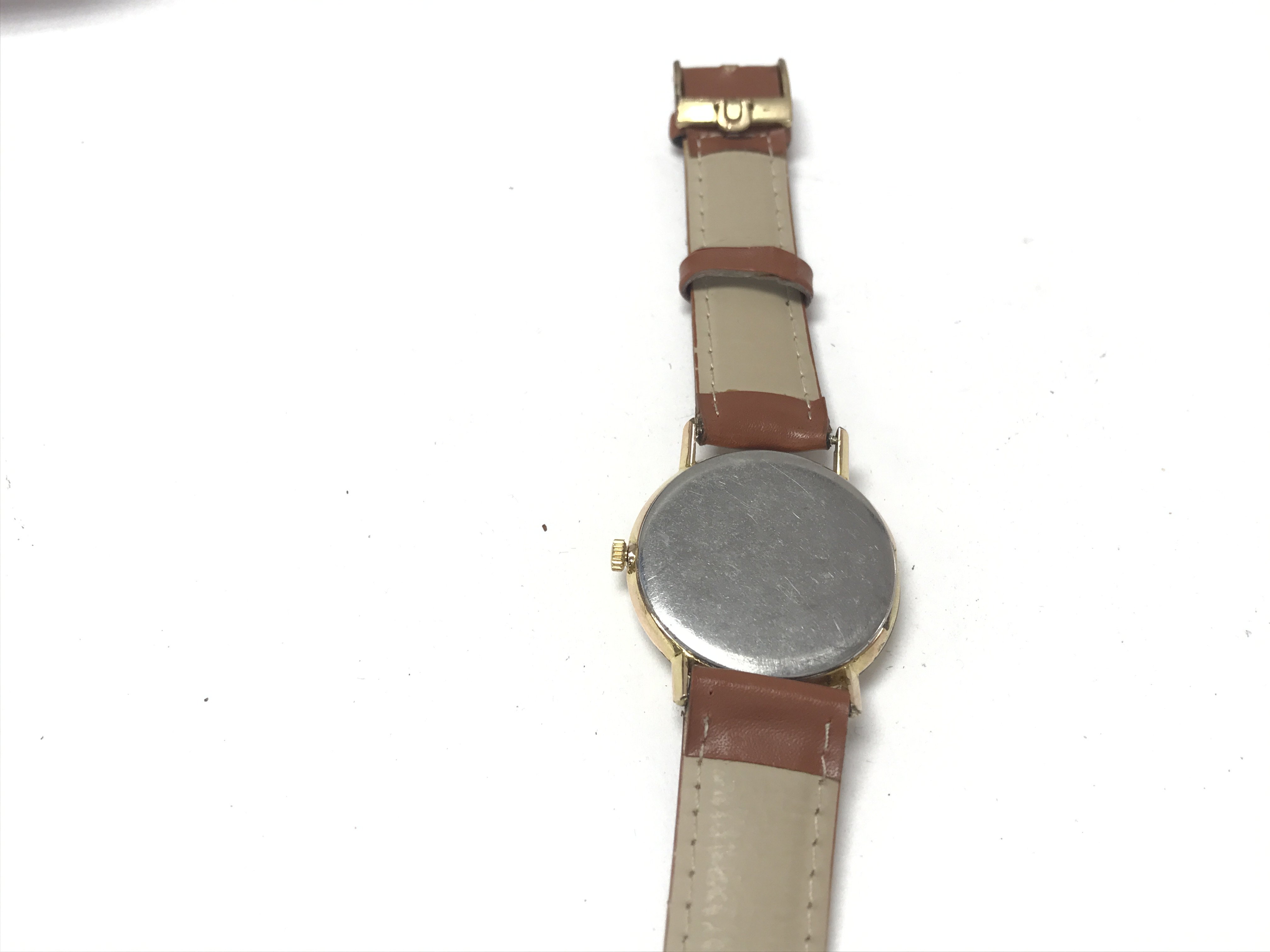 An Omega Gold Plated manual wind wrist watch. Silv - Image 3 of 5