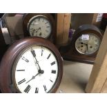 A mahogany circular wall clock, a parquetry mantle