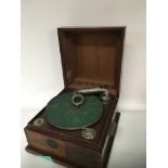 A mahogany gramophone in an unusual shaped Art Dec