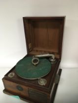 A mahogany gramophone in an unusual shaped Art Dec