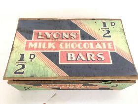 A vintage wooden lyons chocolate bar box and Ameri