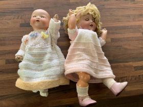 A 2 Armand Marseille German porcelain dolls. (B)