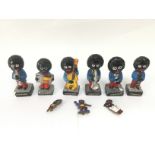 A collection of Robertson's golly band figures and