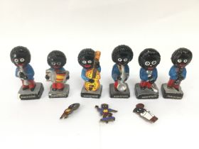 A collection of Robertson's golly band figures and