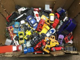 A collection of playworn die cast vehicles and a vintage packaway toy castle. Shipping category C.