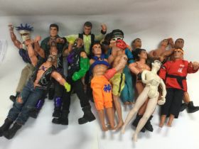 A box of Action Man figures and a collection of accessories and vehicles. Shipping category C.