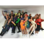 A box of Action Man figures and a collection of accessories and vehicles. Shipping category C.