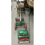 3 antique restored push along mowers. (D). NO RESE