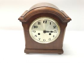 A mahogany mantle clock in need of repair. 28cm by 23cm