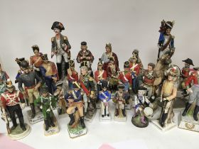 A large collection of porcelain soldier figures of