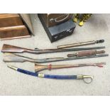 Replica muskets, an Indian curved blade sword, bugle, vintage garden sprayer