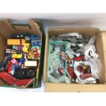Two boxes of die cast vehicles comprising Dinky and Matchbox examples. Shipping category D.