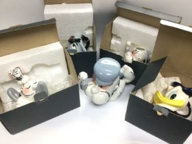 A collection of boxed Paul Cardew character teapot