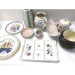 A collection of assorted items of poole pottery.