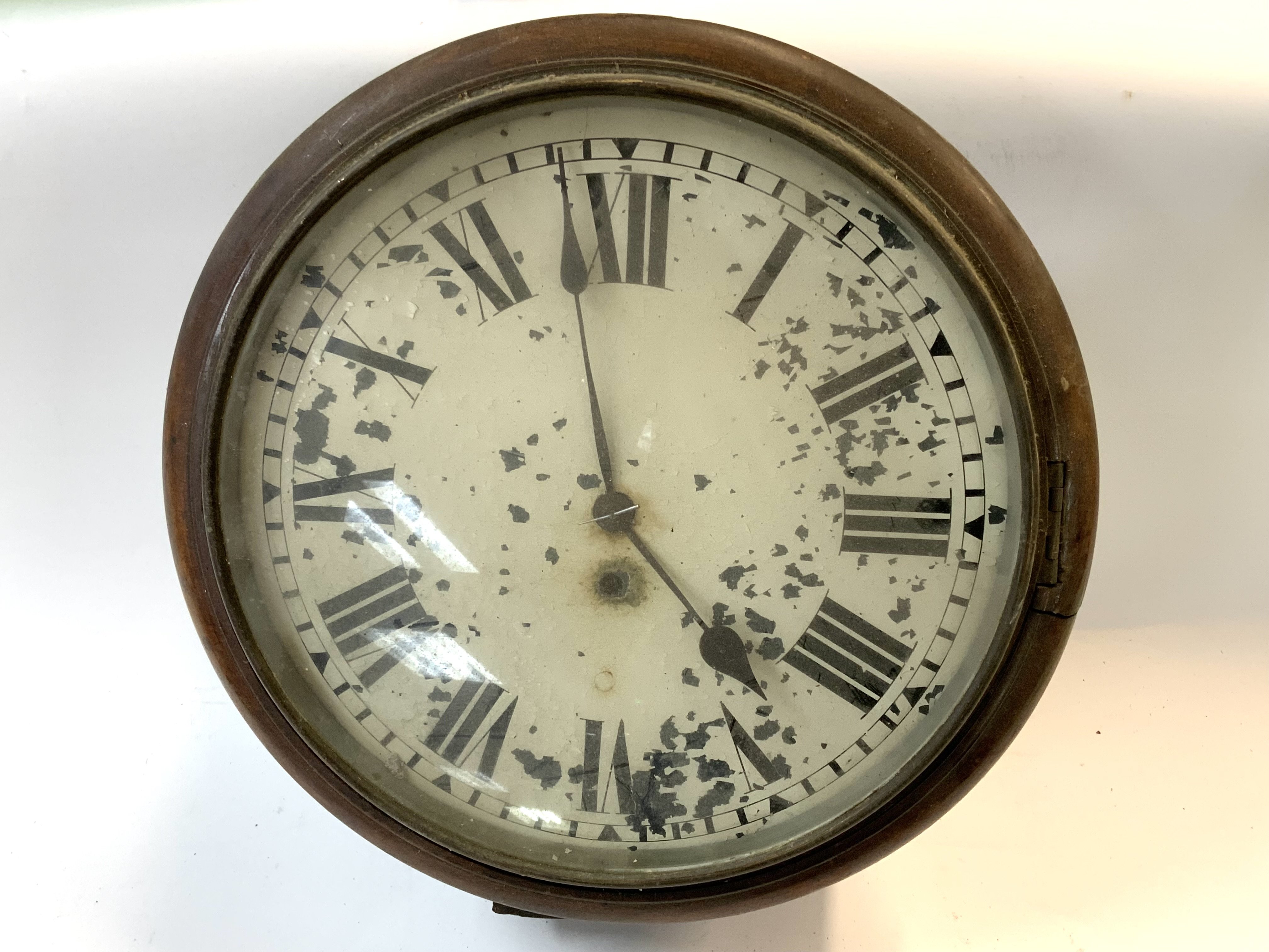 A Victorian fusee wall clock. (Dial in need of attention). 37cm diameter (Catagory D)