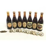 Guinness miniature bottles and buttons. This lot c