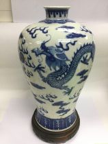 A large blue and white baluster vase decorated wit