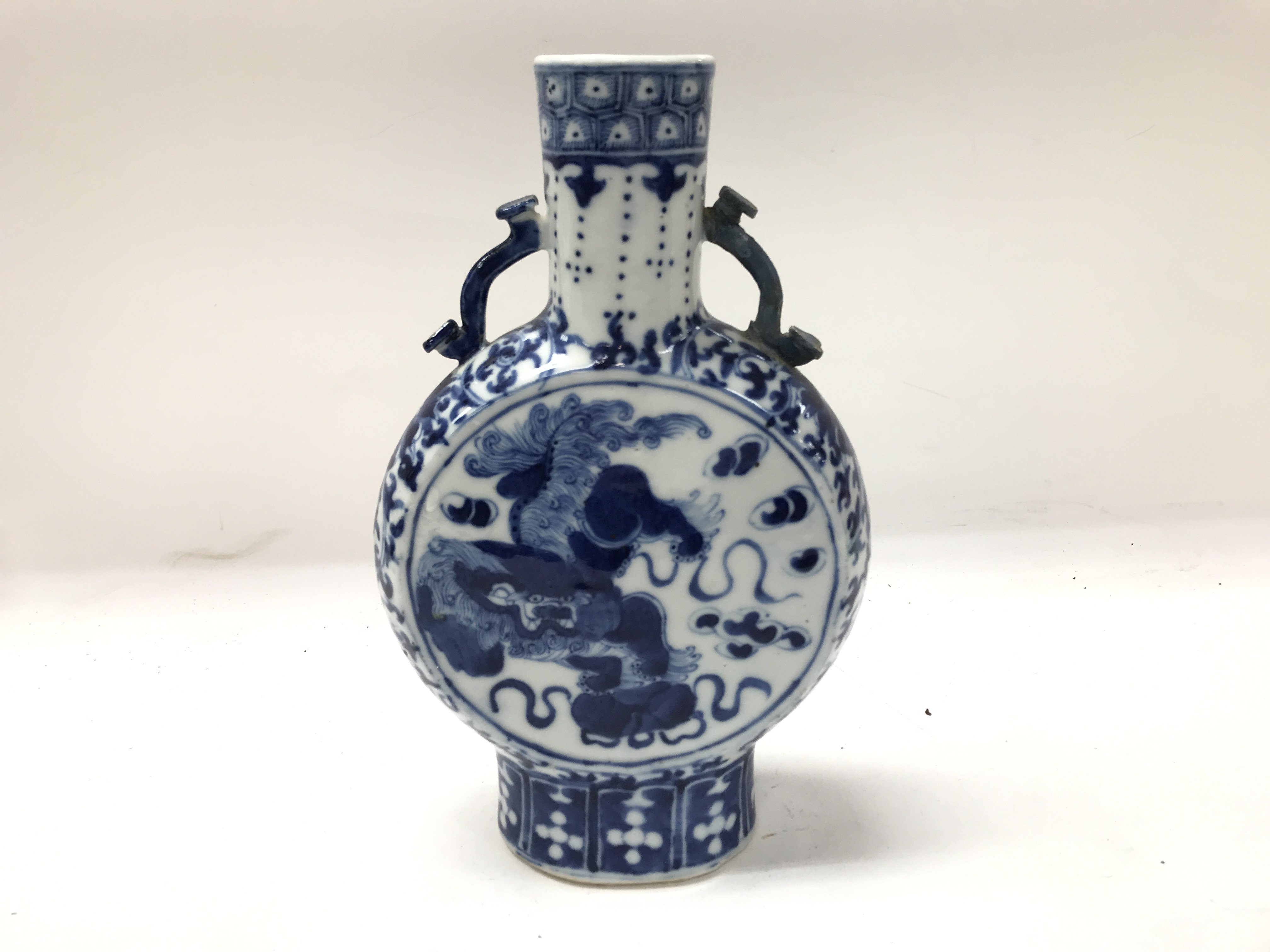 A late 18th century Chinese moon flask, handle has