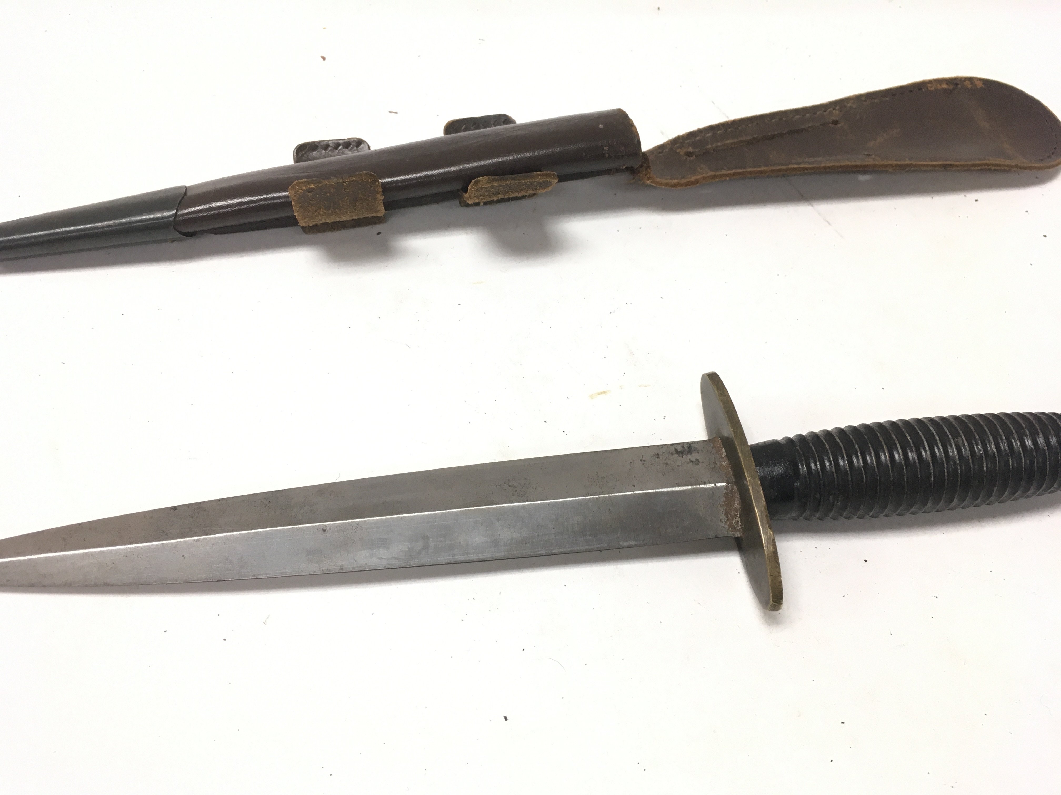 A Fairbairn Sykes fighting knife with leather scab - Image 4 of 5