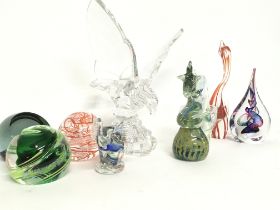 A collection of glass ornaments including an eagle