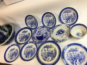 A collection of assorted blue and white items Mand