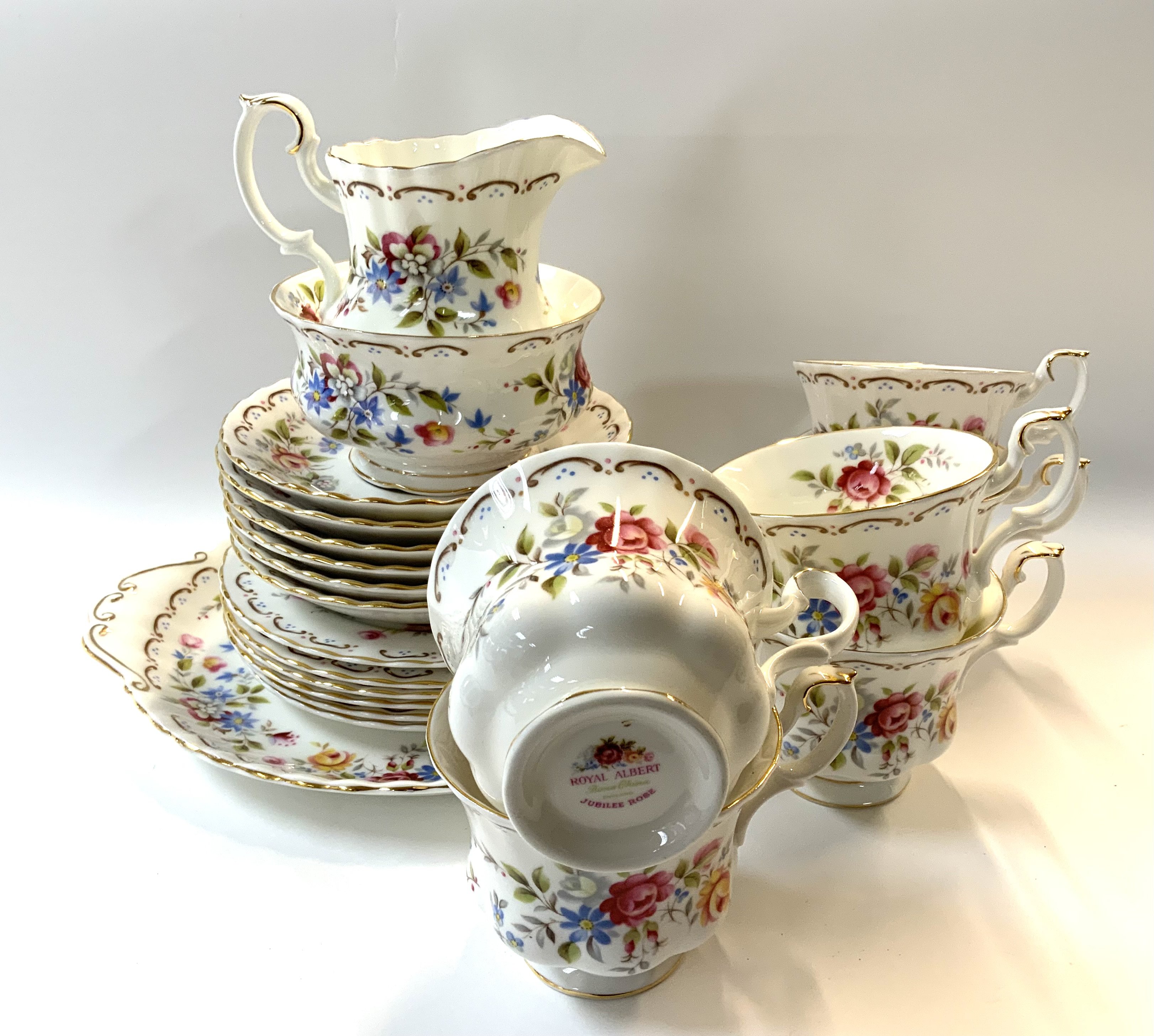 A Royal Albert Jubilee Rose 6 setting tea set. (D)