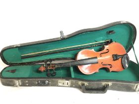 A cased Chinese violin. 48cm long. Postage category C