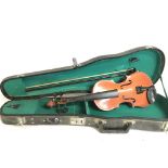 A cased Chinese violin. 48cm long. Postage category C