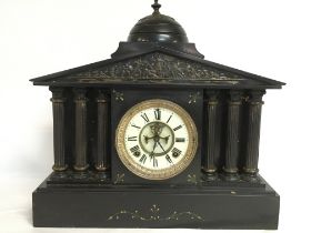 A Victorian style slate mantle clock by The Ansoni